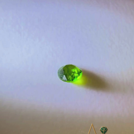 Buy a natural Green Garnet gemstone with vivid green color and natural clarity. Loose, untreated stone suitable for collectors and fine jewelry.