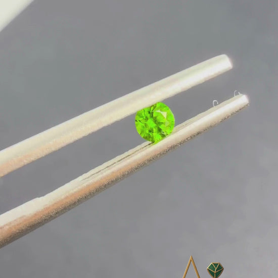 Buy a natural Green Garnet gemstone with vivid green color and natural clarity. Loose, untreated stone suitable for collectors and fine jewelry.