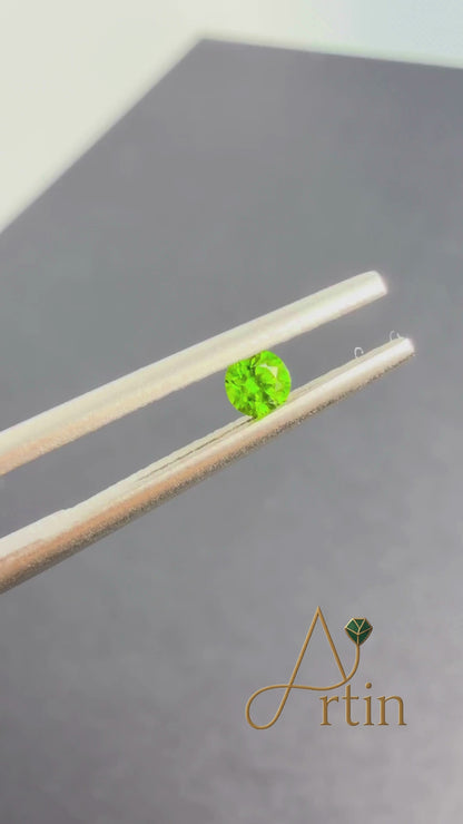 Buy a natural Green Garnet gemstone with vivid green color and natural clarity. Loose, untreated stone suitable for collectors and fine jewelry.